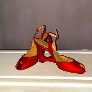 STUART WEITZMAN RED PATTEN LEATHER WEDGIES. WITH CUT OUTS.